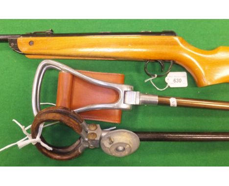 A BSA Meteor .22 air rifle, a game bird shooting stick and a John Collier "The OK" shooting stick