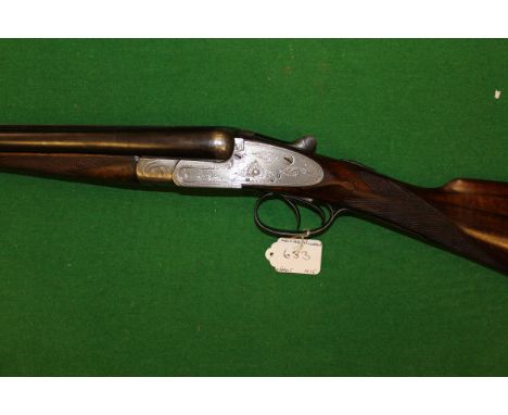 A Frank Garrett 16 bore shotgun, double barrel, side by side, side lock, ejector, 28" barrels (sleeved) (No. 2003) (Purchaser