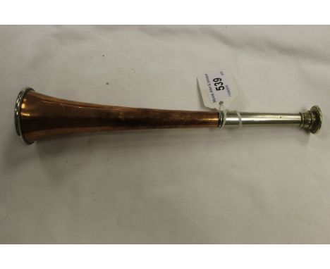 A copper and nickel hunting horn, stamped "Army and Navy Cooperative Society Limited" CONDITION REPORTS Basically sound thoug