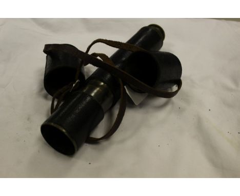 A Negretti and Zambra leather-cased brass-bound three-drawer telescope, inscribed to the inner barrel