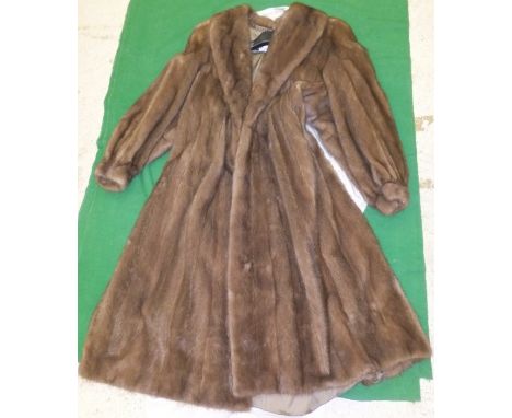 A pale brown full length mink coat, bearing label inside inscribed "Designed by Despina Fur New York Athens Hong Kong", toget