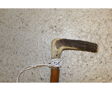 A silver mounted antler handled horse measuring stick with malacca shaft