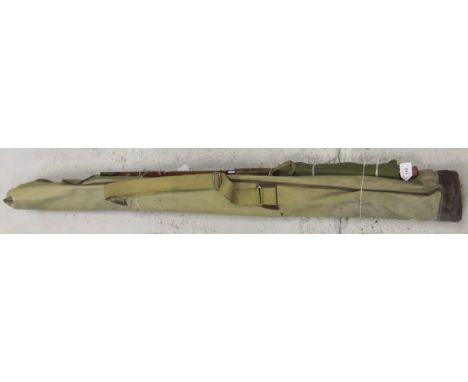 A three piece split cane coarse fishing rod, "Rebuilt by F R Thorncroft", together with a green canvas bag and plastic tube