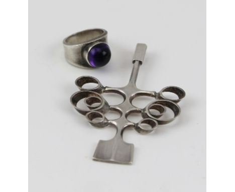 A GEORG JENSEN SILVER RING set with a cabochon amethyst, together with a SILVER DAVID ANDERSEN NORWEGIAN TREE DESIGN PENDANT 