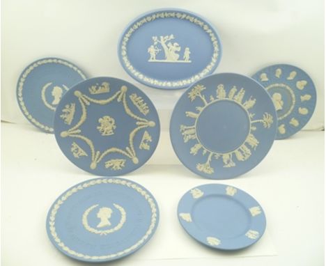 A COLLECTION OF SEVEN ASSORTED WEDGWOOD CERAMIC BLUE GROUND PLATES with cameo decoration, includes a special edition of 10,00