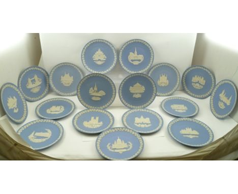 A COLLECTION OF SEVENTEEN WEDGWOOD CHRISTMAS PLATES, pale blue ground ceramic with applied cameo decoration, 21cm diameter (1