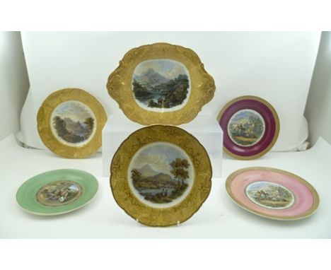 A COLLECTION OF 19TH CENTURY PRATTWARE including; a dessert comport of gilded double handle form, two dessert plates with mat