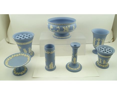 A COLLECTION OF WEDGWOOD PALE BLUE GROUND CAMEO APPLIED CERAMIC ITEMS, includes vases, tazza, candlestick etc. (7) 