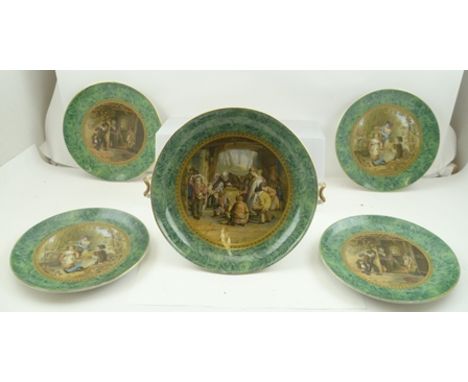 A LATE 19TH CENTURY PRATTWARE PART DESSERT SERVICE comprising; a comport and four plates, the comport decorated with a school
