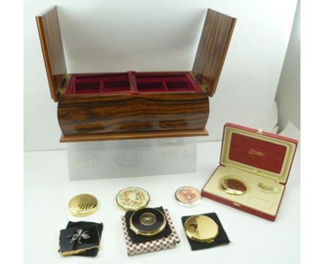 A POLISHED WOOD JEWELLERY BOX, together with a collection of POWDER COMPACTS, including a floral enamel and marcasite decorat