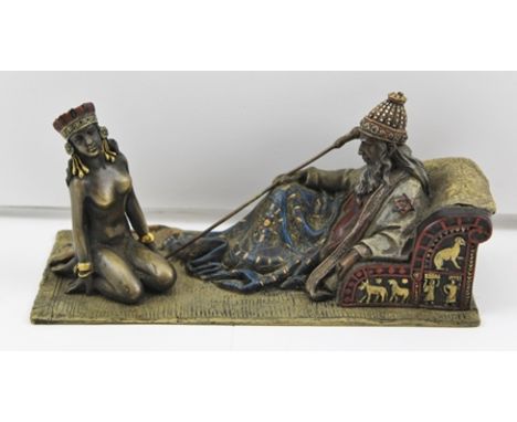 A BRONZE IN THE STYLE OF BERGMAN "Master and his slave girl", partially painted and gilded, base 18cm x 8.5cm 