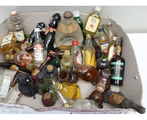A LARGE COLLECTION OF MINIATURE SPIRITS AND LIQUEURS including novelty bottles and many old bottlings, ceramic Black Poodle C