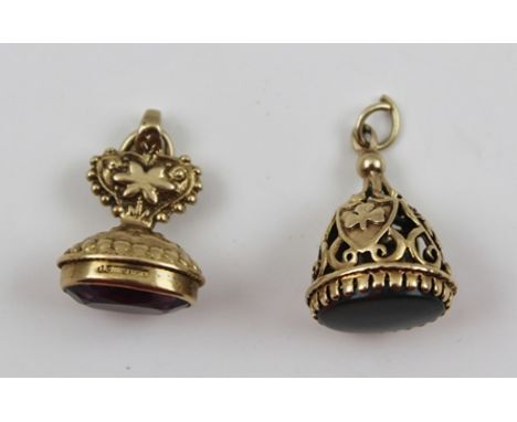 A 9CT GOLD FOB inset with an oval facet cut amethyst, together with a STONE SET YELLOW METAL FOB (2) 