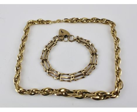 A 9CT GOLD GATE LINK BRACELET with padlock clasp, 11g., and a 14k fancy link NECKLACE, 9g. (2) 