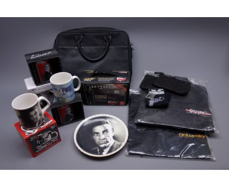 Quantity of James Bond memorabilia and promotional items including two polo shirts embroidered Goldeneye and Tomorrow Never D
