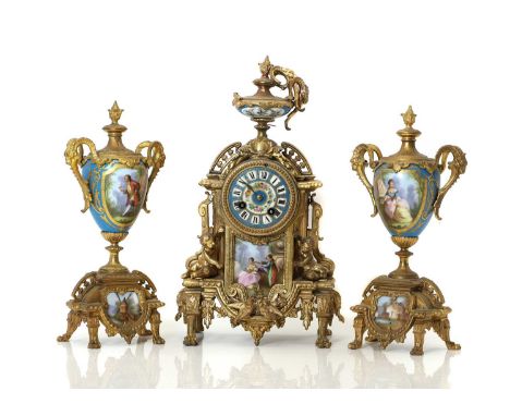 A Louis XVI style gilt metal clock garniture,  19th century, French, decorated with enamelled porcelain plaques, depicitng cl