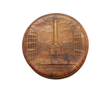 A French pressed wood snuff box, c.1820, the lid with a view of 'Colonne de la Place Vendome', with interior lining, 8.3cm di