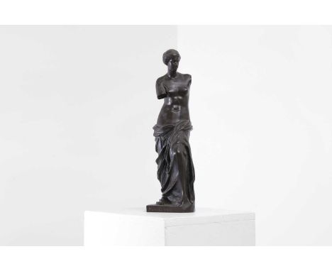 A patinated bronze figure of the Venus de Milo, late 19th/early 20th century, French, a reduction cast by F Barbedienne after