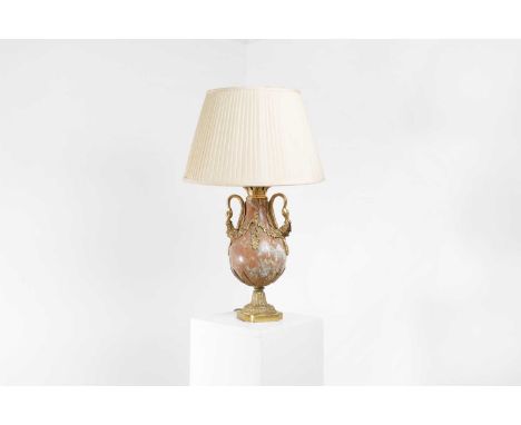 A neoclassical marble and gilt-brass table lamp, early 20th century, French, with swan-neck handles and leaf moulded decorati