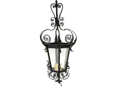 A painted wrought iron lantern, 19th century, 40cm diameter95cm high,Condition Reportwith a candle inside and a perforated pe