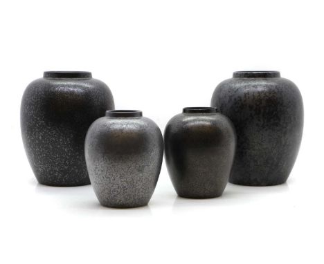 A collection of Poole Pottery Calypso range vases c.1980 British, with a black and silver speckled lustre, two stamped on the