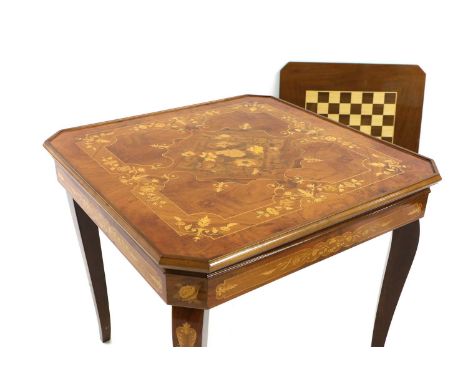 A games table, with chess board, backgammon, opening to reveal a roulette wheel, together with a collection of games counters