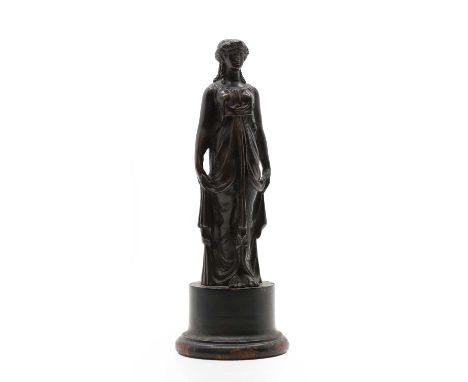 A Grand Tour style bronze figure of a Classical woman in a draped dress, on a wood socle,23cm highCondition ReportWear to the