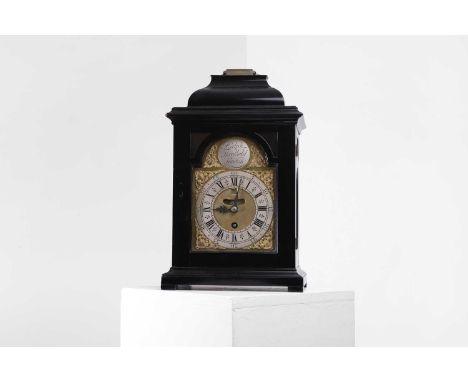 A George II ebonised table clock, 18th century, the silvered 5½-inch dial with Roman numerals and signed 'Ralph Threlkeld Lon