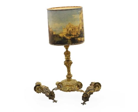 A brass table lamp, 20th century, with moulded floral and acantus decoration,40cm high to the fittingtogether with a pair of 