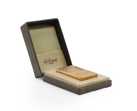 A DuPont gold plated cigarette lighter, with geometric milled decoration, inscribed to base5.75cm high