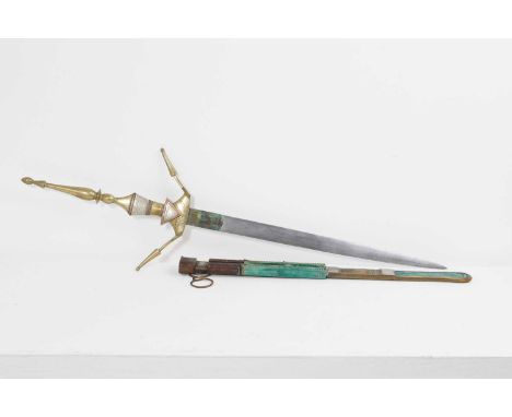 A Tuareg sword, 20th century, with a tapering straight blade, the hilt and handle in brass and mounted to one side with coppe