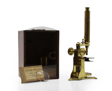 A lacquered brass microscope, by Baker, London, together with three cylindrical lens cases, one inscribed 'Baker, London 1/4 