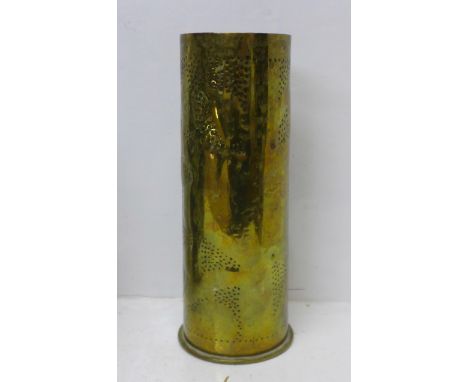 A brass trench art shell vase, marked on the base 1917, Dusseldorf 