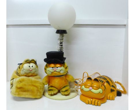 A Garfield lamp, telephone and tissue box cover 