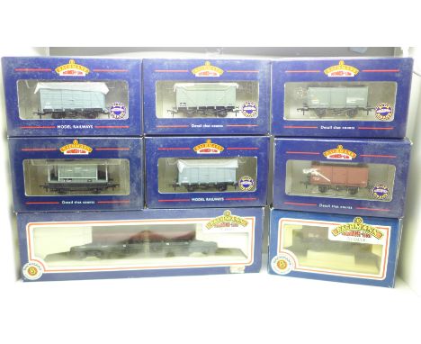 Seven Bachmann Branch Line 00 gauge model railway wagons and a carriage, boxed 