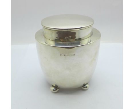 A silver tea caddy with gilt interior, Birmingham 1921, 176g, (some dents) 