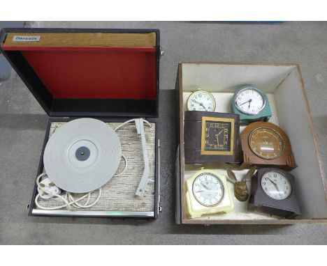 A record player and electric clocks **PLEASE NOTE THIS LOT IS NOT ELIGIBLE FOR POSTING AND PACKING** 