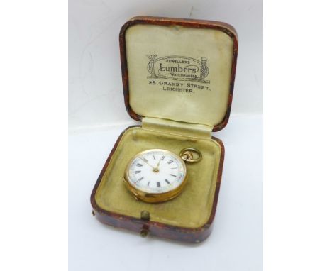 A lady's 14k gold fob watch with enamel dial, 28mm case 