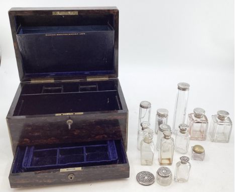A coromandel dressing box with fitted interior, white metal topped items retailed by R Leuchars, Piccadilly, with key, 34 x 2