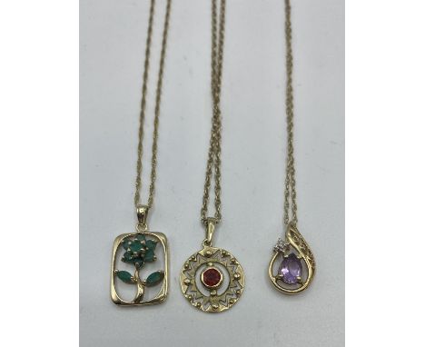 Three 9 ct gold chain link necklaces with gem set pendant 7.60 g 