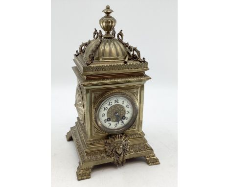 A large C19th French 8 day mantle clock , cast brass case with relief floral decoration,  circular dial, movement by J Marti,