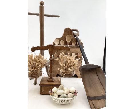 A pine spoon rack, a set of pine scales, wash dolly and a grain shovel 