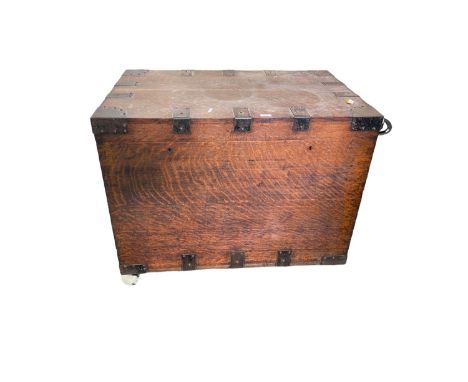 A heavy rustic Victorian oak brass bound trunk silver chest, with large carrying handles, 92cm W x 61cm D x 71cm H. ONE MISSI