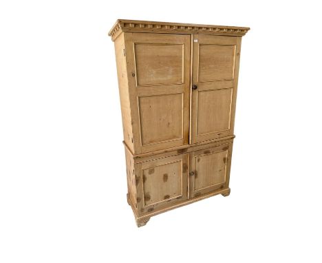 A light pine two sectioned house keepers cupboard, of small proportions, 126 cm W x 49.5 cm D x 188.5 cm H 