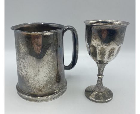 A sterling silver mug with glass bottom. Birmingham 1934. Together with a white metal wine goblet, and a quantity of other si