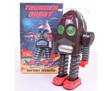 Thunder Robot (China) tinplate battery operated, a reissue of 1950’s Asakusa Toy, brown body, in near mint boxed condition,he