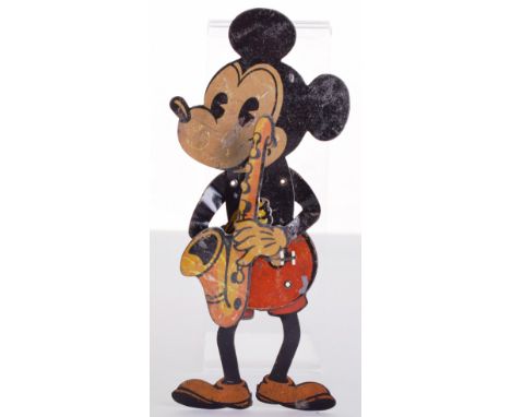 Tinplate Mickey Mouse Saxophone playing hand toy, German circa 1930, lithographed in various colours, lever to rear when depr