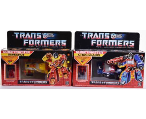 Two Boxed Hasbro G1 Targetmaster Transformers,1986 issues, ‘Sureshot’ transforms from dune buggy to robot and back, ‘Crosshai