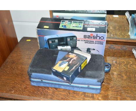 A personal stereo speaker system; together with a Bush portable cassette recorder