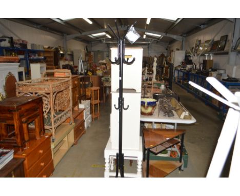 A metal hat and coat stand